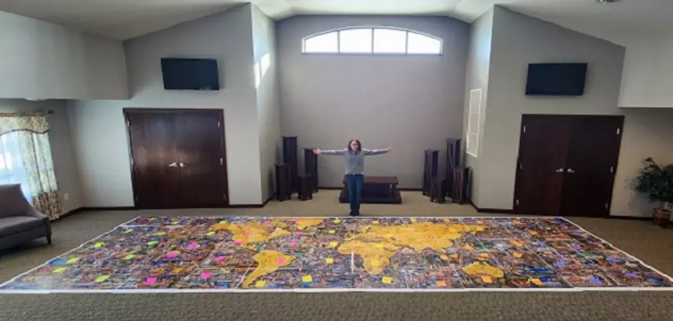Wisconsin Community Tackles 60,000-Piece Puzzle + Finish With One Piece Missing