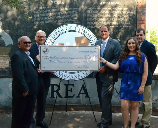 Texarkana Chamber of Commerce  Presents Check to Red River Committee