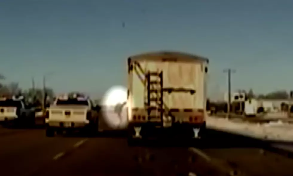 Sheriff Risks Own Safety To Save Truck Driver [VIDEO]