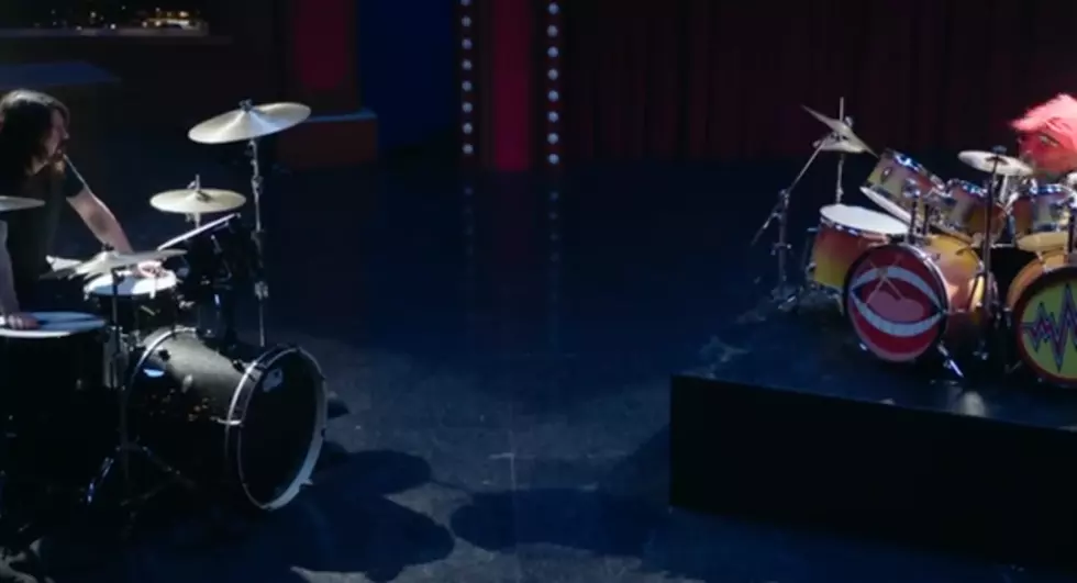 Watch Muppet’s Animal vs. Foo Fighter’s Dave Grohl in an Epic Drum Battle