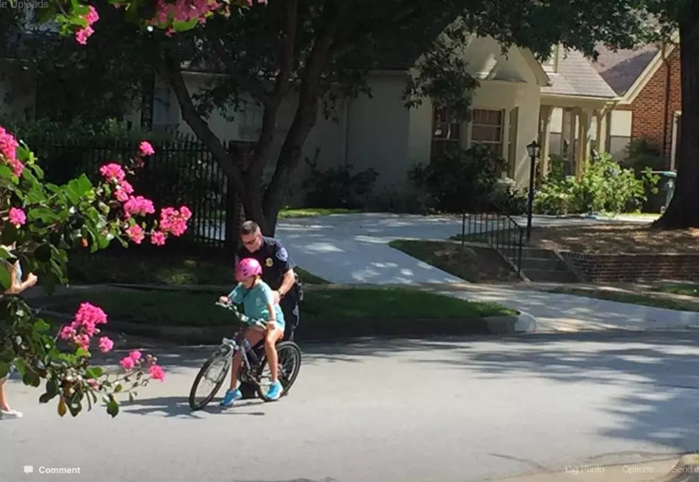 This Photo of a Tyler Officer and Girl Learning to Ride a Bike is Everything