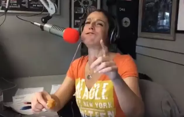 Watch The RockShow Co-Host Kelly Plasker Stuff Donut Holes in Her Mouth