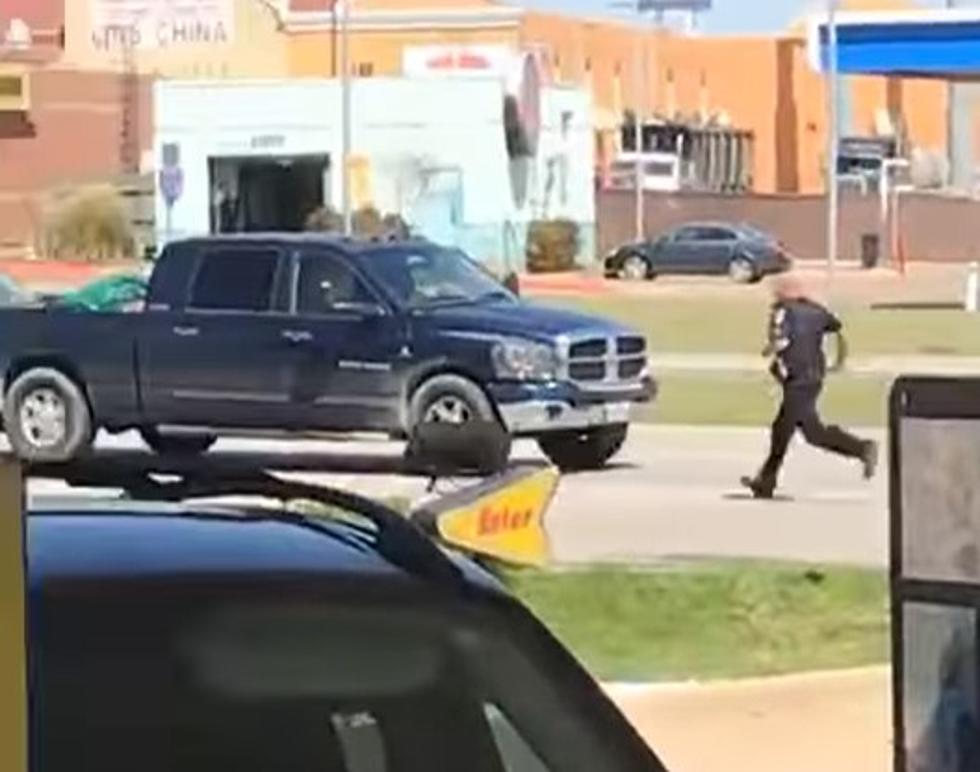 Video: Nothing Says ‘Texas’ Like a Cop Chasing a Pig Through a Sonic Drive-in Parking Lot