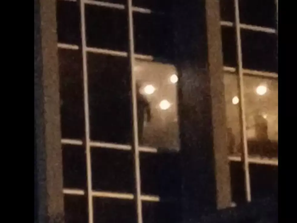 Video: TikToker Creeped Out By Spooky Figure Staring From Dark Lubbock Office Building