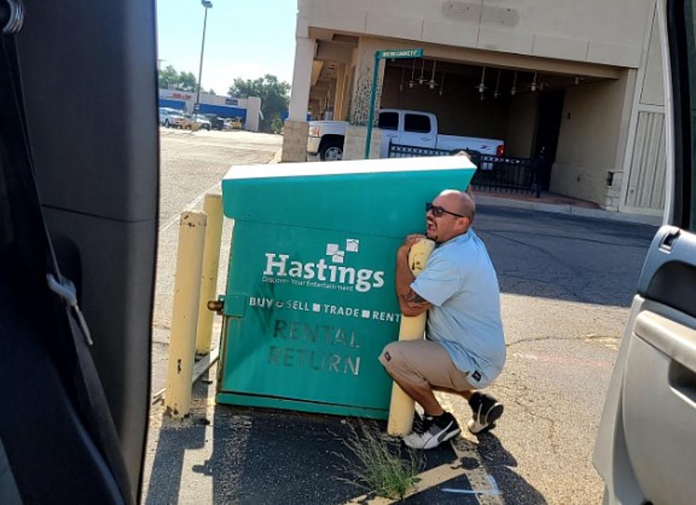 Lubbock Man Clings To Hastings Return Box, Cries Out For Mercy