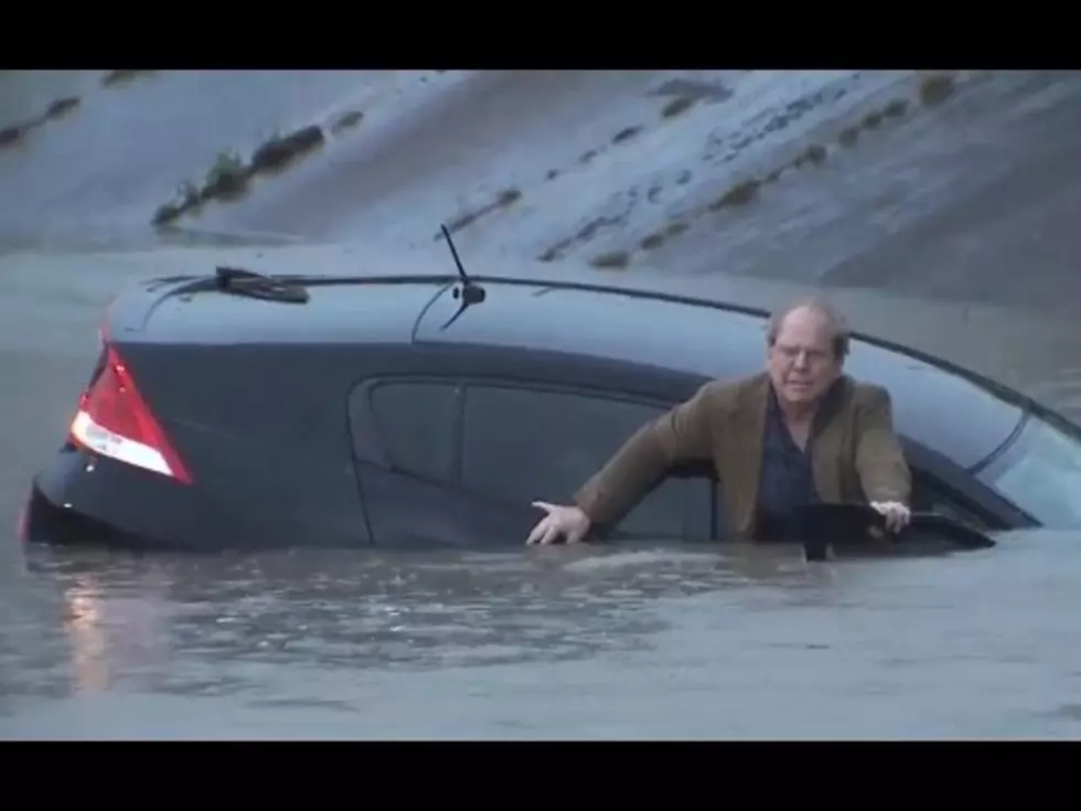Reporter Saves Flood Victim Live on the Air [VIDEO]