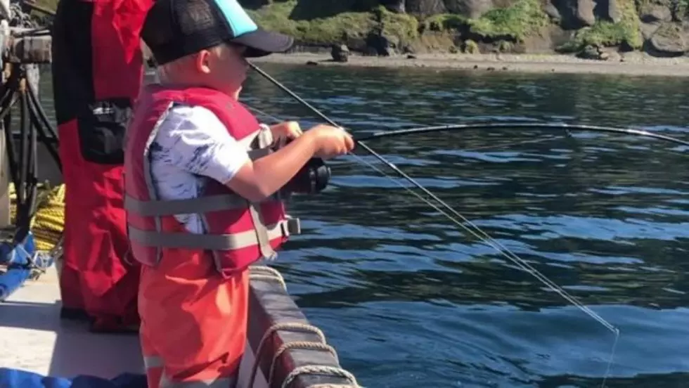 An Adorable Three-Year-Old Can’t Believe He’s Reeling In A Fish
