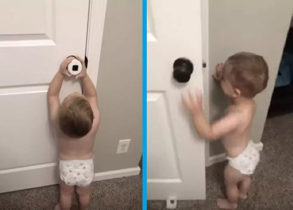 A Toddler Opens A Childproof Doorknob