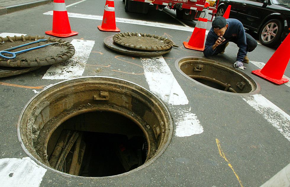 Woman Falls Into Open Manhole While Texting [VIDEO]