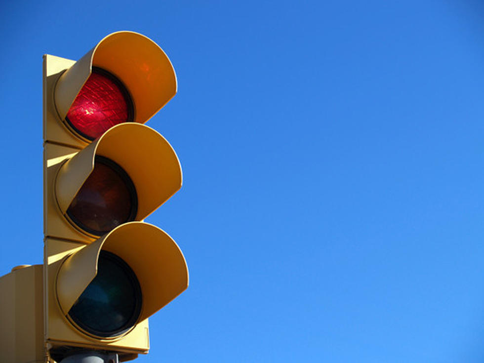 Pedestrian Fixing a Traffic Light Goes Wrong