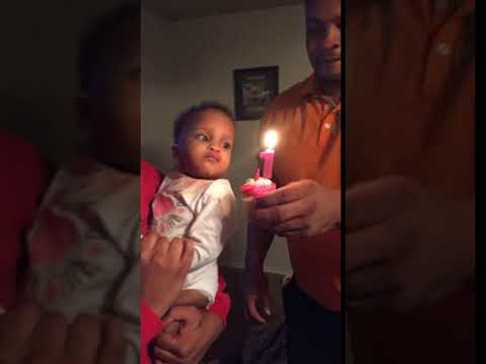 Baby Smacks Candle Lit Cupcake Instead of Blowing It out