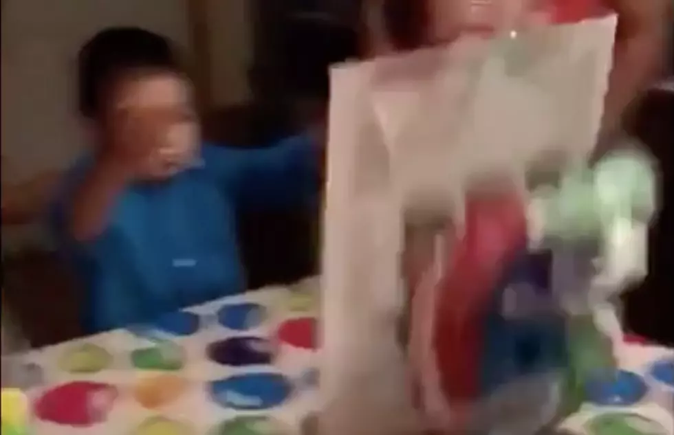 Impatient Kid Flips Birthday Cake While Family Watches in Shock