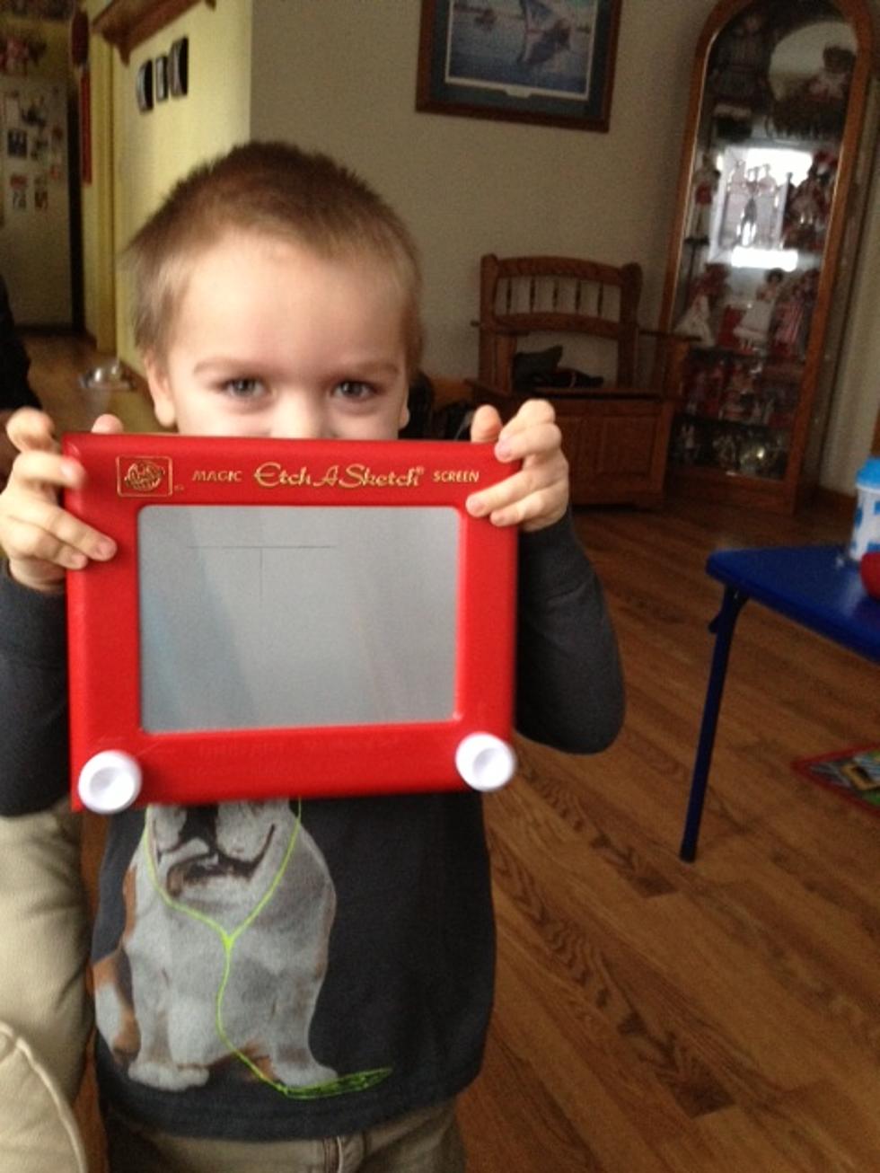 Gus Shows Rayman How to Draw With an Etch-A-Sketch
