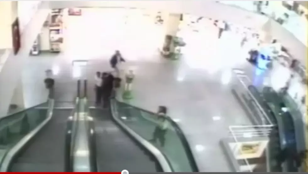 Man Rescues Boy From Fall Off An Escalator [Video]