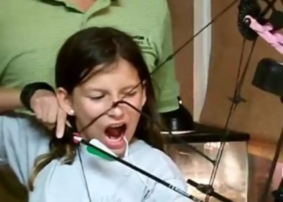 Girl Pulls Out Tooth Using a Bow &#038; Arrow [VIDEO]