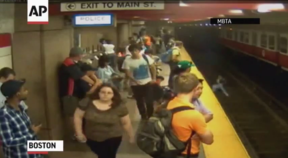 Woman In Boston Steps Off Train Platform, With Son In Her Arms [VIDEO]