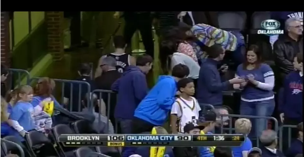Oklahoma City Thunder Fan Grabs Kris Humphries and Wishes She Didn’t [VIDEO]