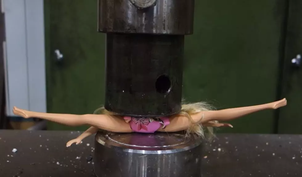 See Barbie Get Squished by a Powerful Hydraulic Press
