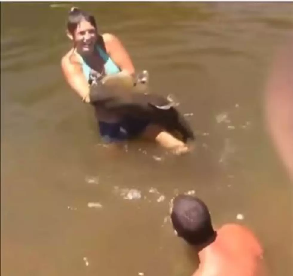 Girl Catches Giant Disgusting Catfish with Her Bare Hands [VIDEO]