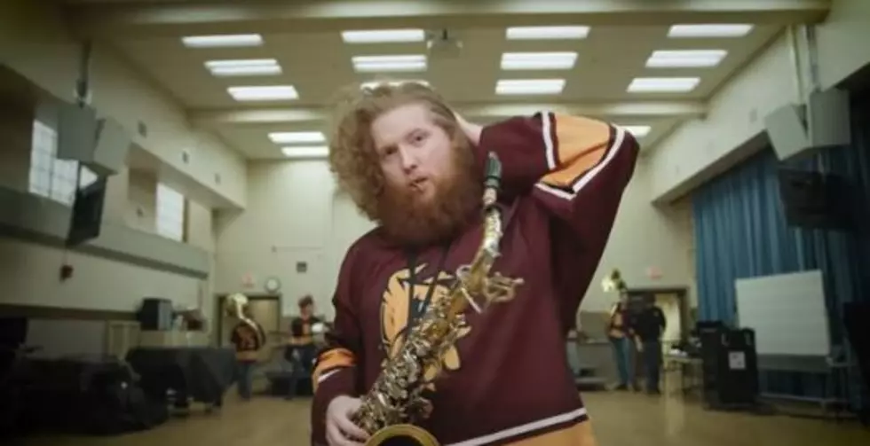 The UMD Pep Band Shows Off Their Hockey Hair Lineup