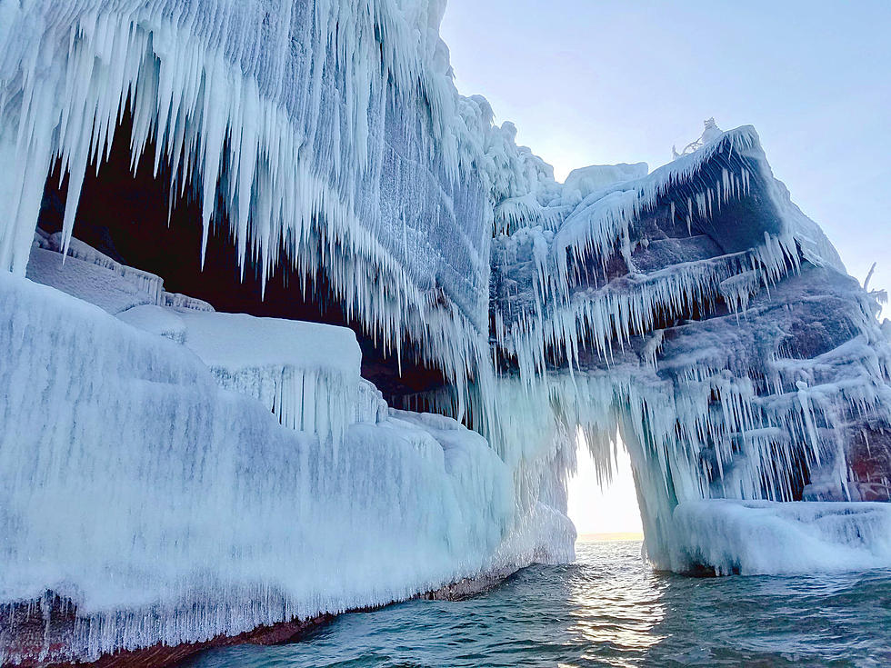 How To Tour Northern Wisconsin’s Breathtaking Ice Caves By Boat This Winter
