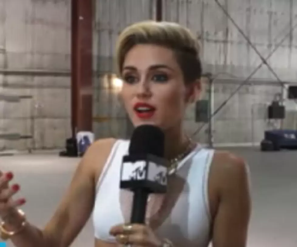 Miley Cyrus Struts in the Subway in New MTV VMA Promo, Announces New Album Title [VIDEO]