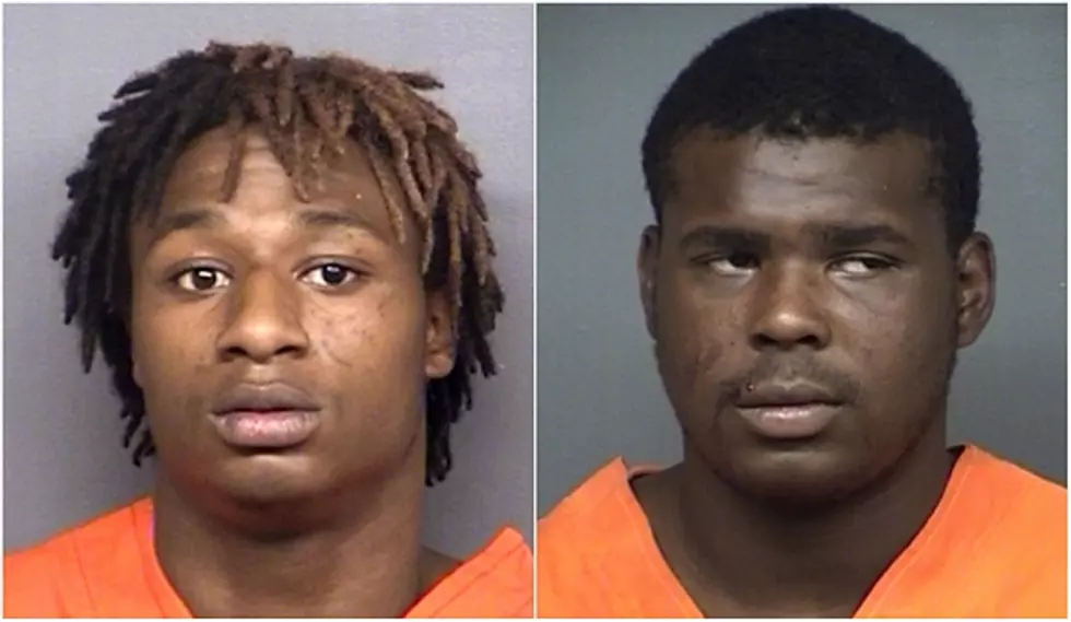 TWO CHARGED IN SHOOTING