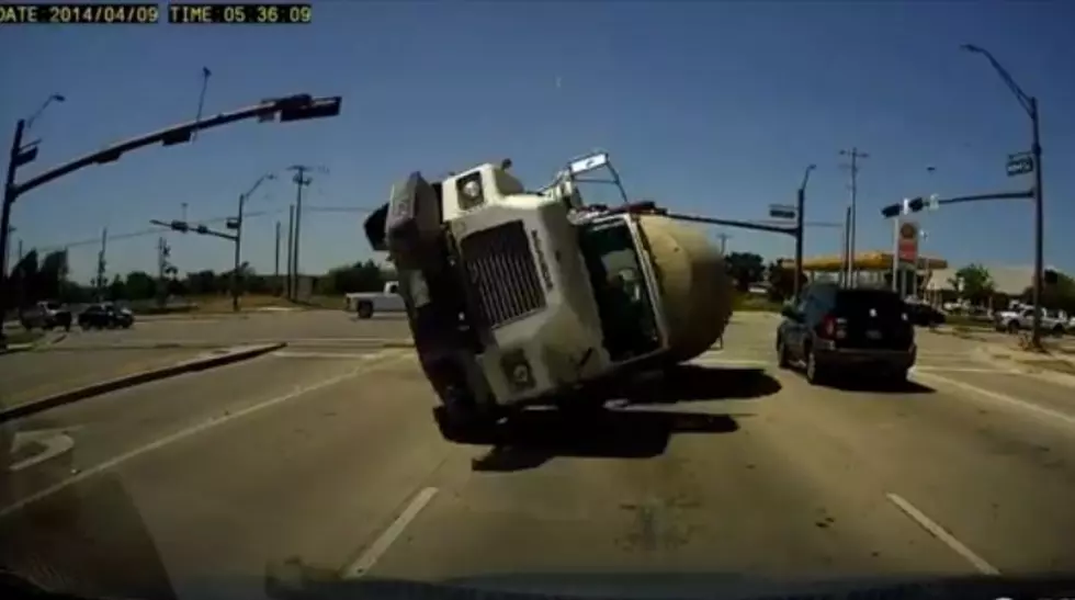 Incredible Dash Cam Video Shows Head-On Collision With Rolling Cement Truck