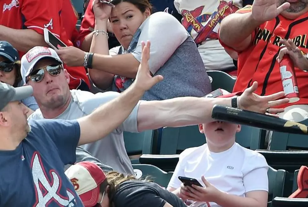 Baseball Fan Saves Boy From Getting Hit in the Face With a Bat