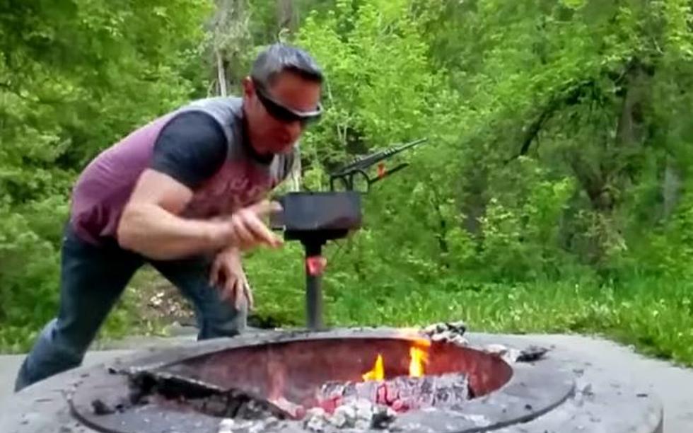 Man Juggles Hot Coals From a Burning Fire [VIDEO]
