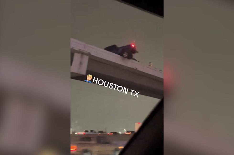 Scary Moment as Truck Hangs Off Houston Overpass