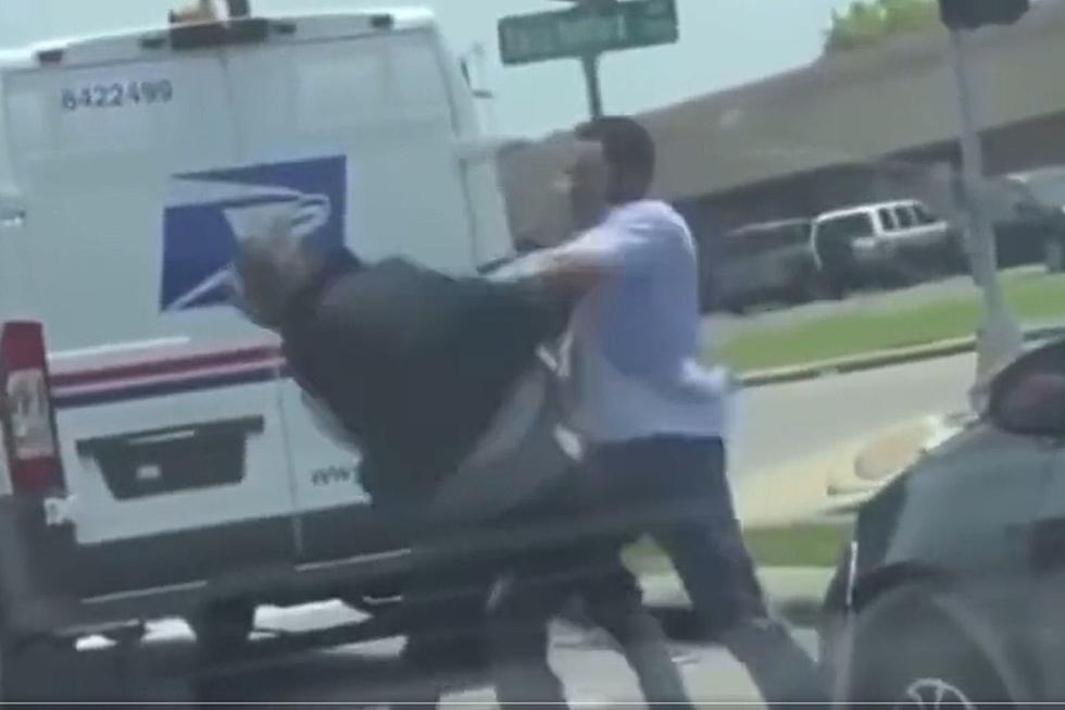 Insane Encounter: USPS Driver and Angry Commuter Face Off in Houston Traffic Battle
