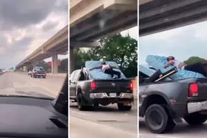 Watch Man Hold Down Truck Bed Mattress on Busy Texas Highway