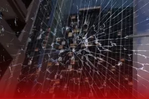 Shards of Glass Raining Down From Shattered Houston Skyscrapers
