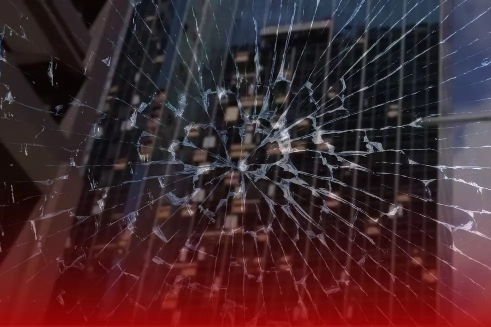 Shards of Glass Raining Down From Shattered Houston Skyscrapers