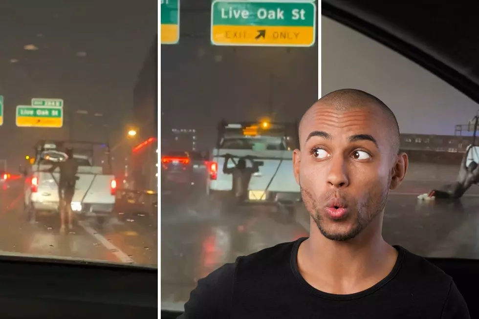 Watch Naked Man Hang on Back of Truck During Pouring Rain in Texas