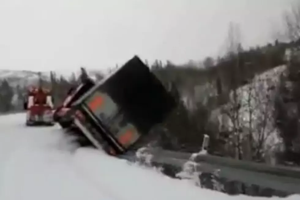 Tow Truck Goes Over Cliff, Driver Bails Out Just in Time [VIDEO]