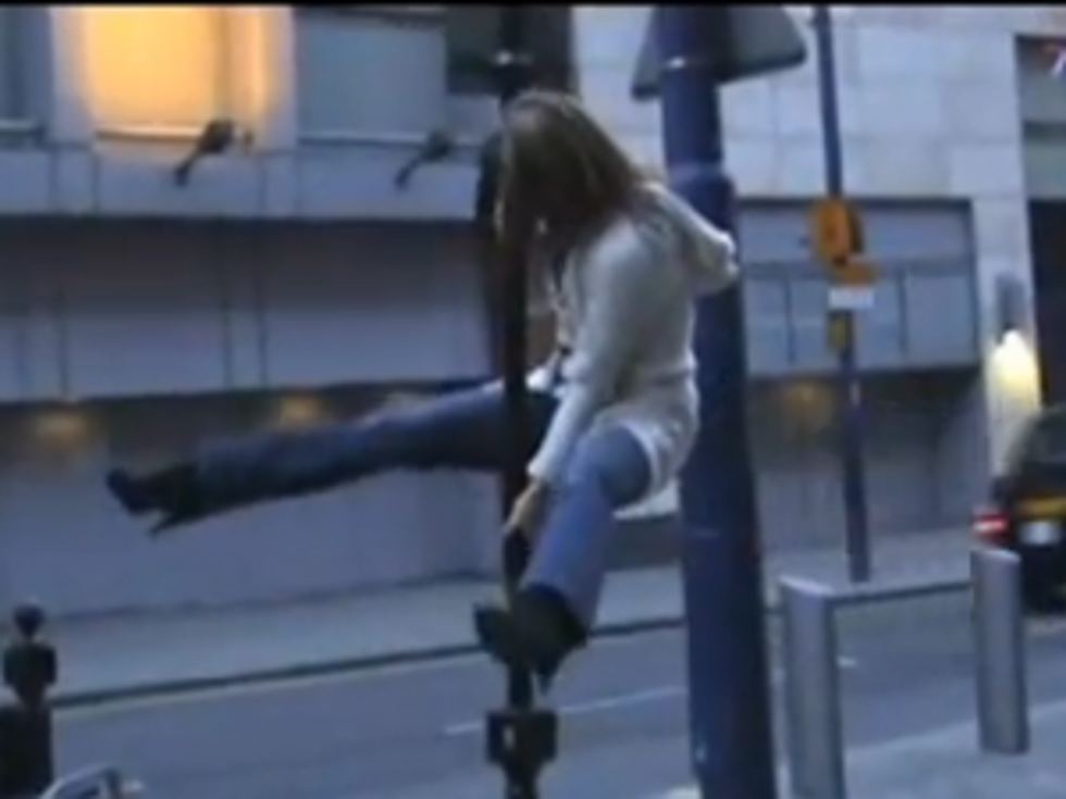 Urban Pole Dancing by Prostitutes Wreck Street Signs [VIDEO]
