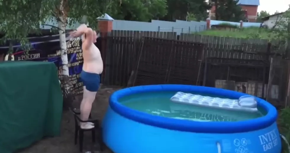Man Somehow Fails at Jumping in Pool [VIDEO]