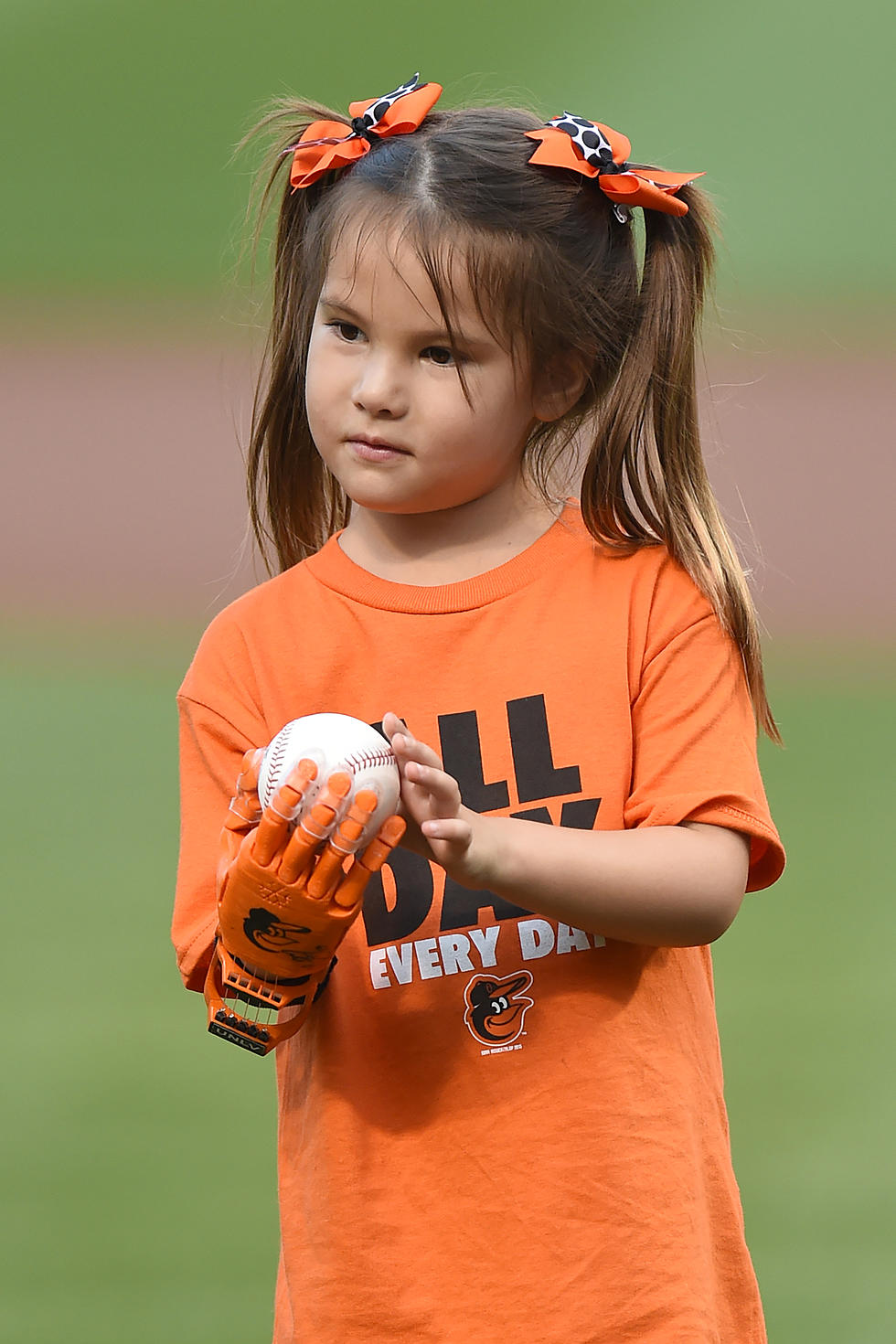 Little Girl With Prosthetic Hand Throws Out First Pitch at MLB Game