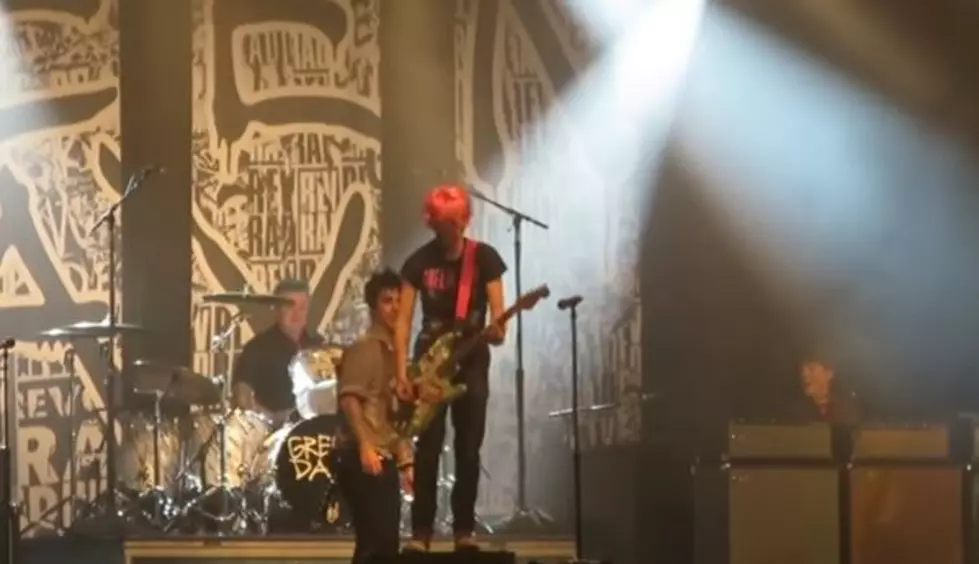 Fan Invited Onstage by Green Day Kills It on Guitar [VIDEO]