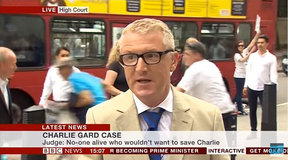 Man Hit by Bus During BBC Live Report [VIDEO]