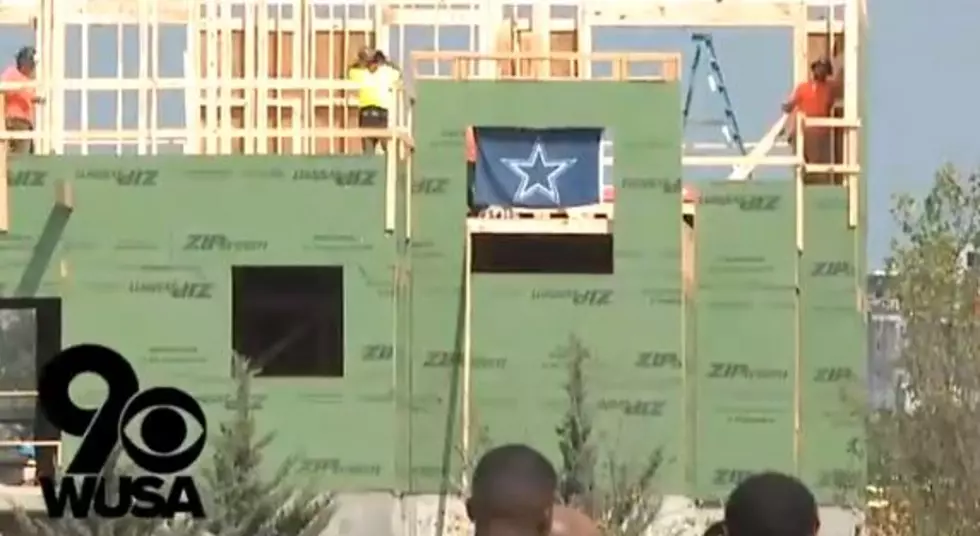 Cowboys Fans Put Up Flag Just Outside of Redskins Training Camp