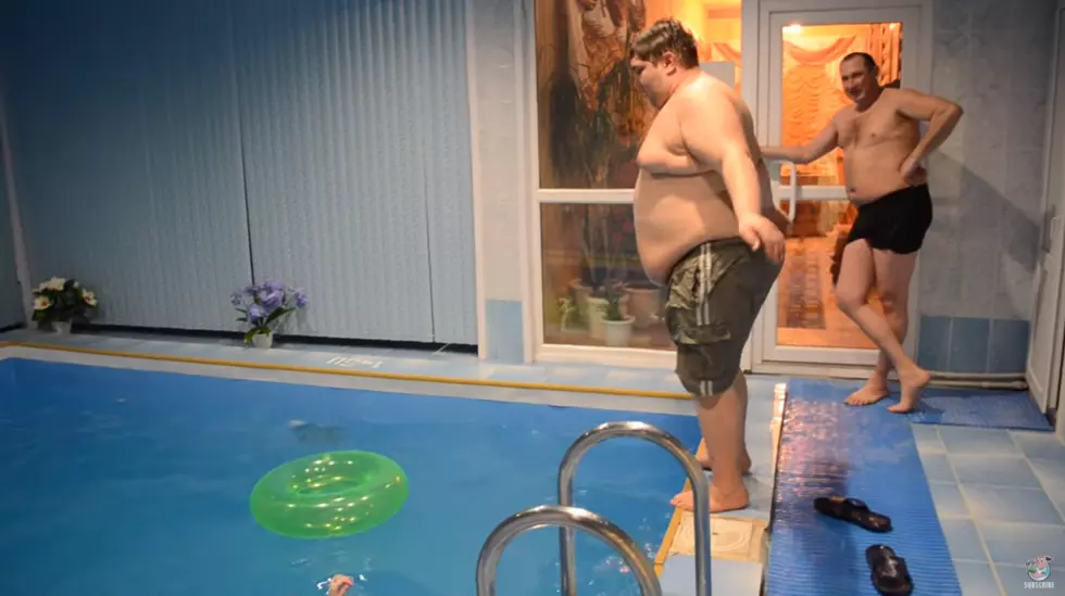 Big Dude Somehow Dives Through Tiny Pool Toy