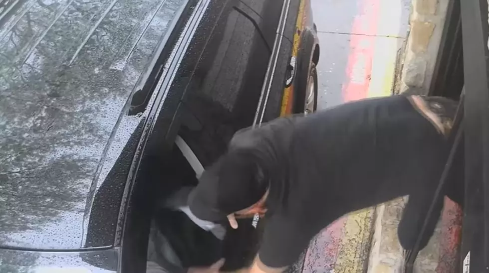 WATCH: Texas Drive-Thru Worker Crawls Through Window and Attacks Customer