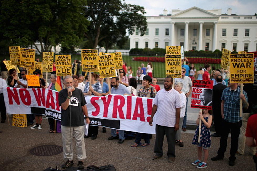 Demonstrators Gather In Houston To Protest Syria Action