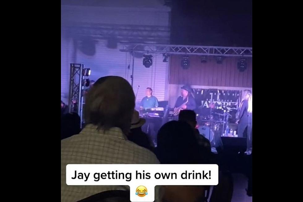 Jay Perez Gets Himself a Drink During His Set in Gonzales, Texas
