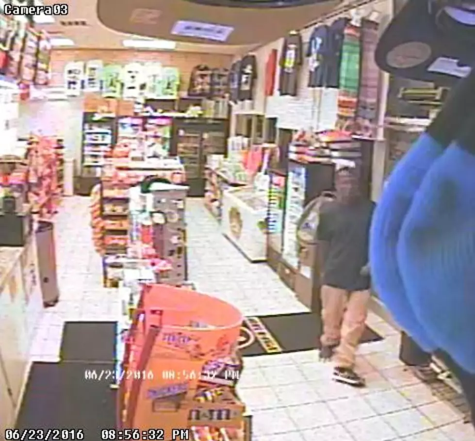 Surveillance Photos Released from Convenience Store Robbery