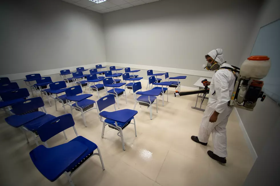 Virus Surge: Schools Abandon Classes