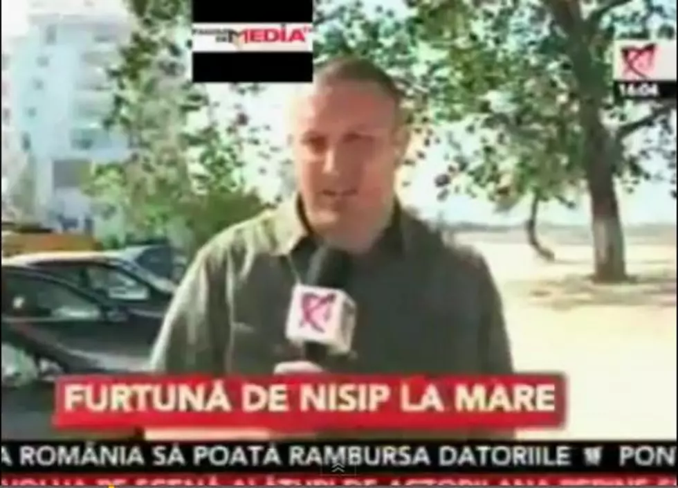 WATCH: Romania News Man Fakes Sand Storm